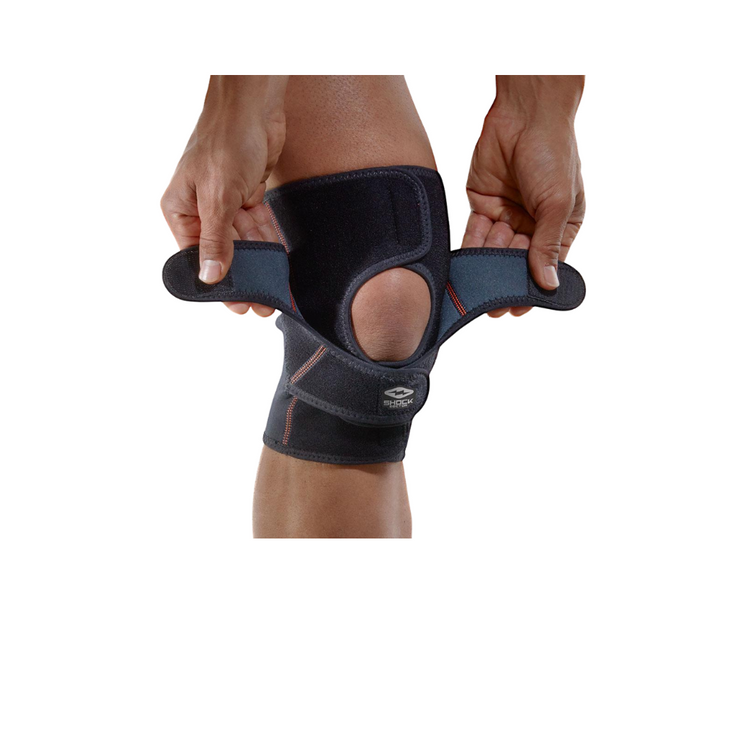 man putting on a knee brace