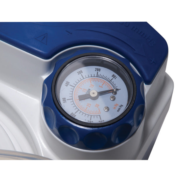 Close-up of a pressure gauge on a blue and gray device
