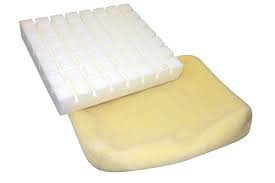 Foam block with a white top and beige bottom on a white background