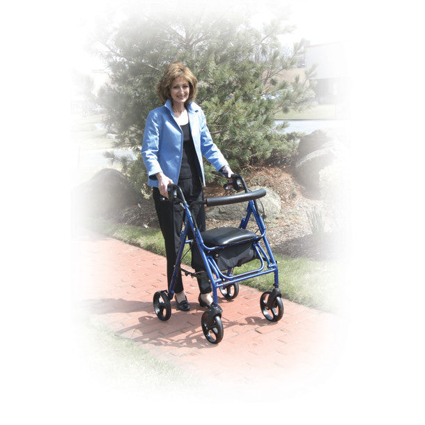 Woman using a blue walker outdoors on a path with trees in the background