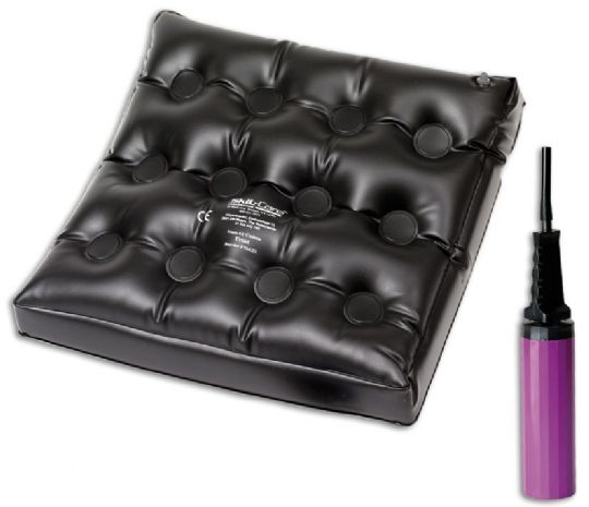 Black inflatable cushion with air pump on a white background