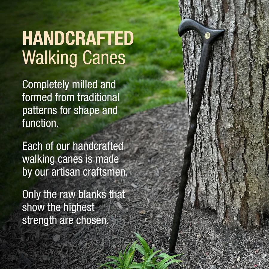 Handcrafted walking cane leaning against a tree with promotional text about craftsmanship.