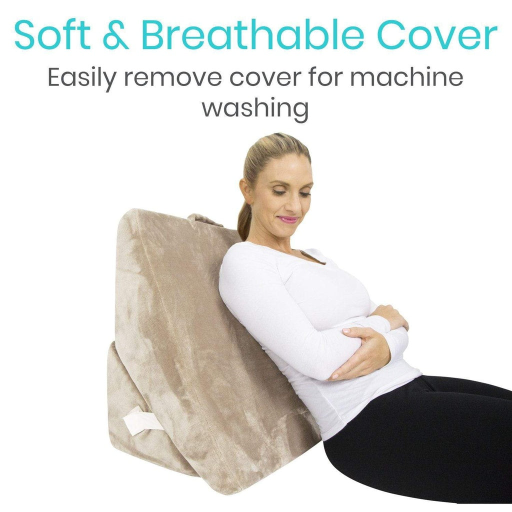 Woman using a beige backrest with text about a soft and breathable cover for machine washing.