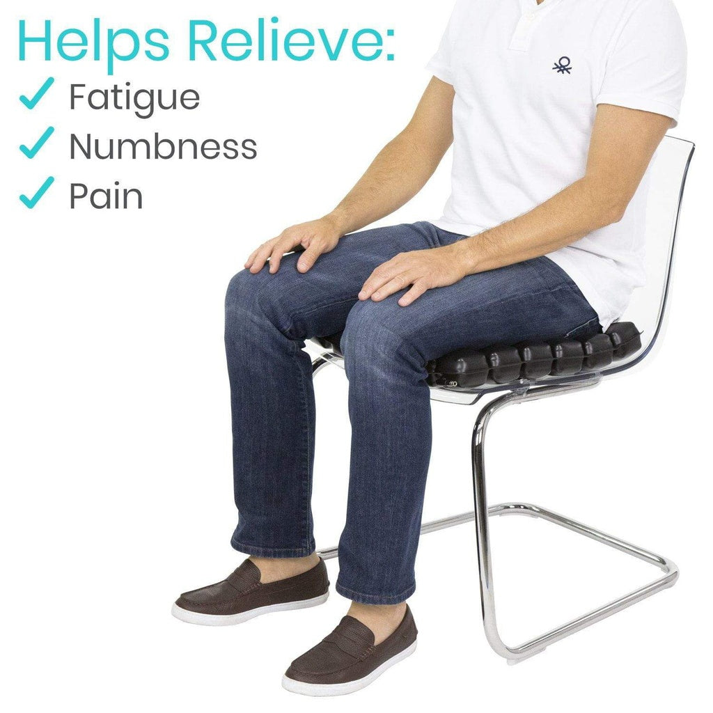 Person sitting on a chair with a cushion, text indicating relief from fatigue, numbness, and pain.