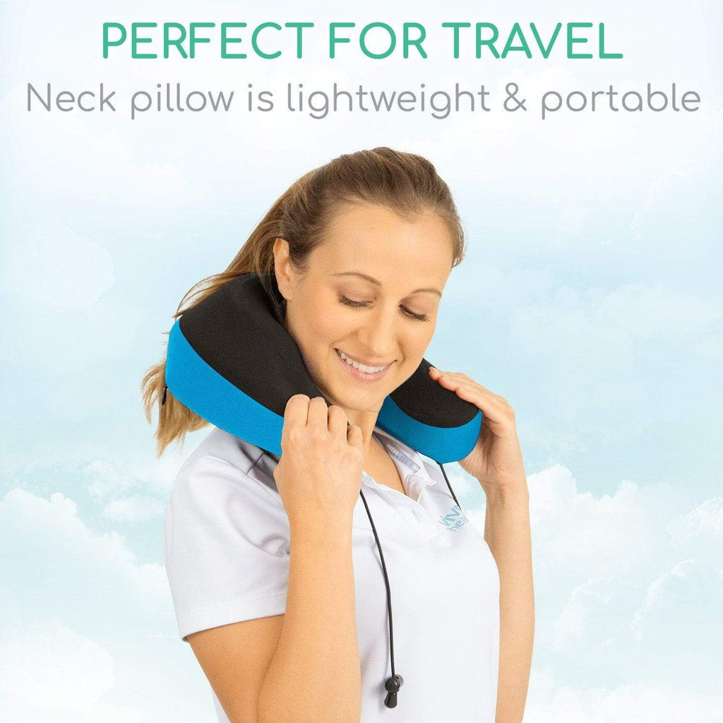 Woman using a travel neck pillow with a blue and black design against a light blue background.