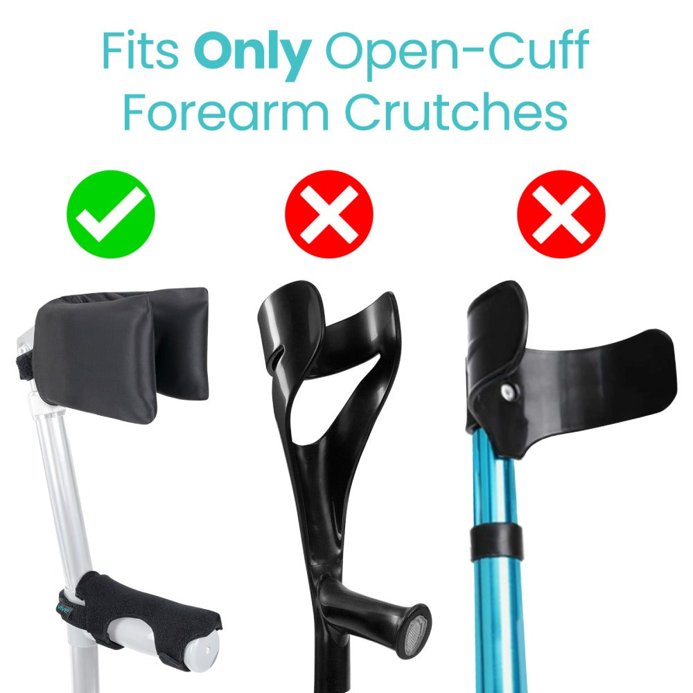Black crutch arm pad with text indicating compatibility for open-cuff forearm crutches on a white background.