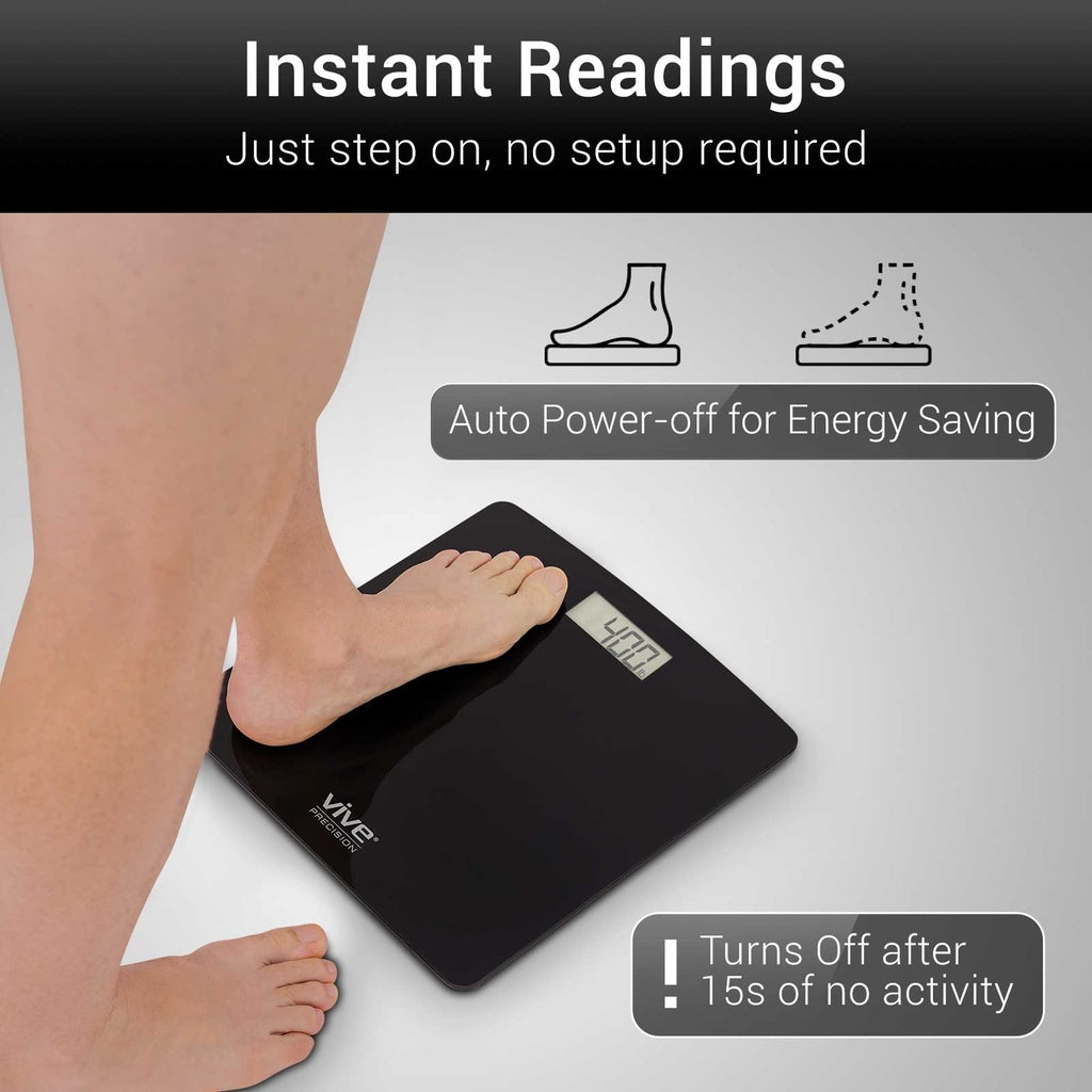 Person stepping on a digital bathroom scale with features highlighted.