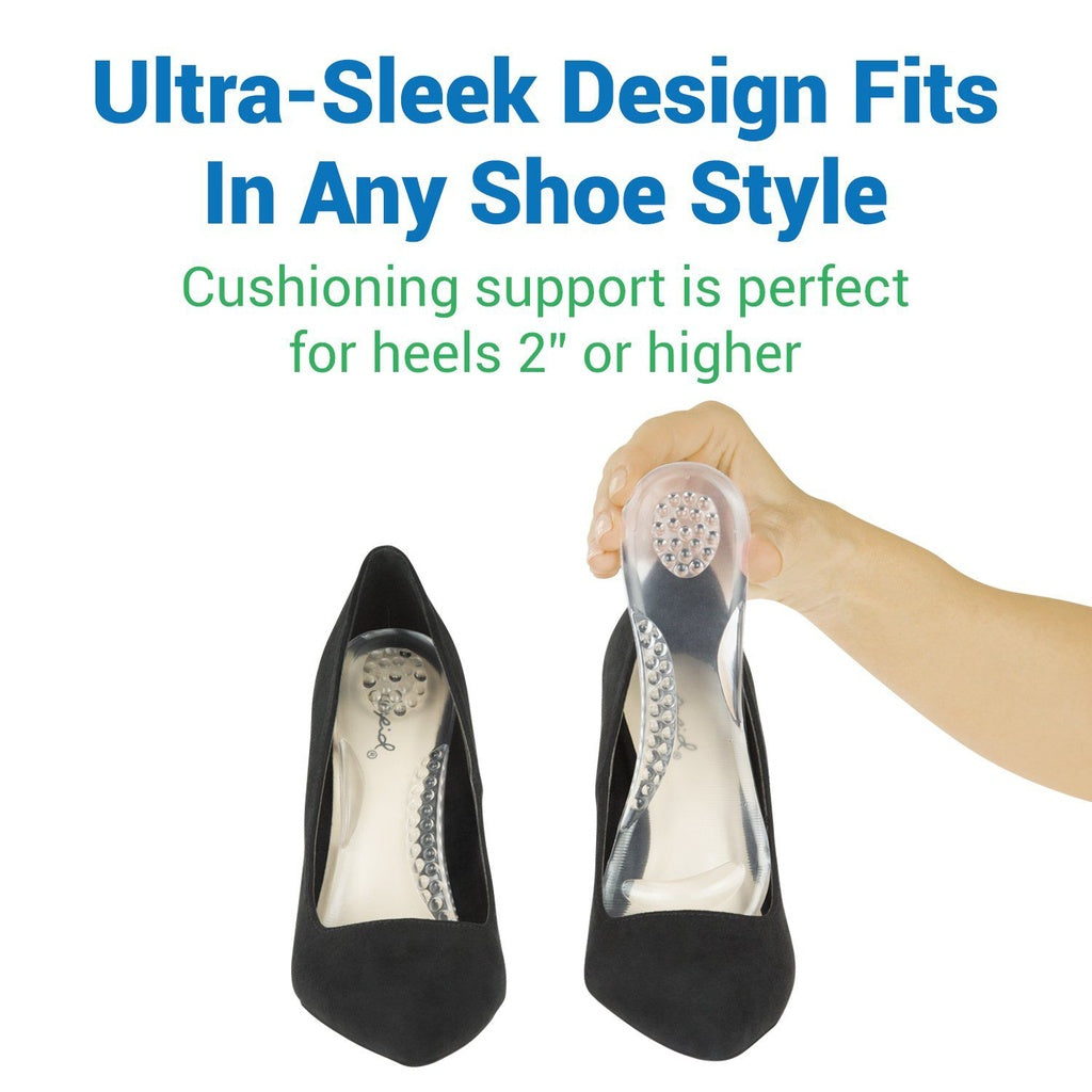 Black high-heeled shoes with a clear shoe insert being held, on a white background.