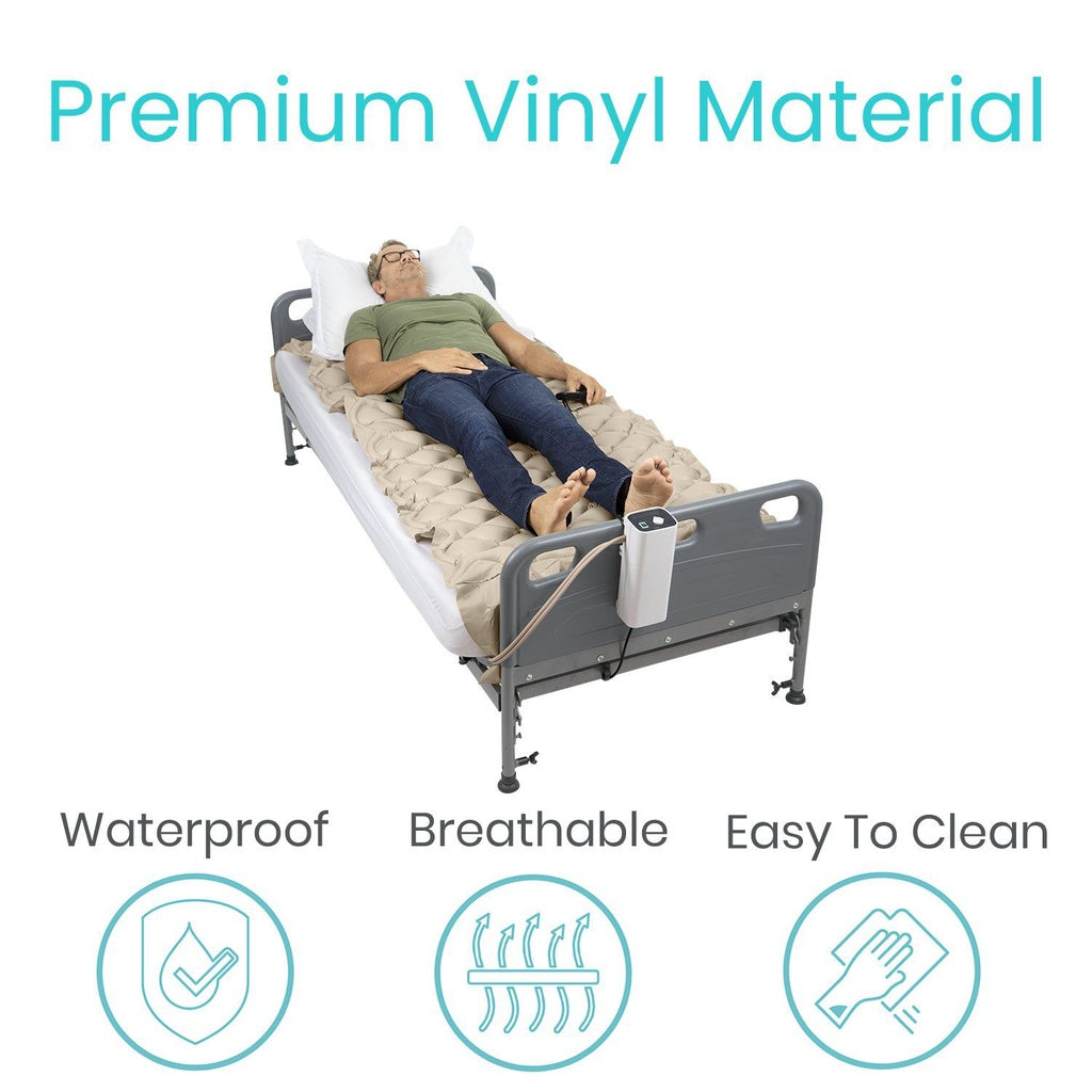 Man lying on a hospital bed with a mattress topper, highlighting premium vinyl material features.
