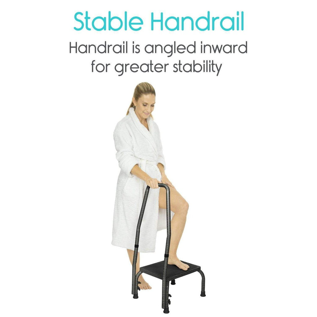 Woman in a white robe using a stable handrail with text indicating it is angled inward for greater stability.