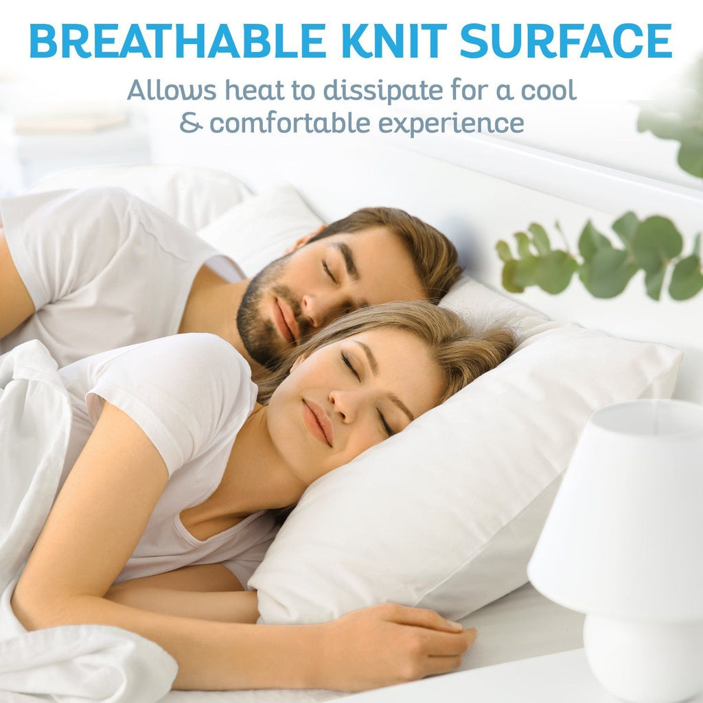 Couple sleeping under a breathable knit blanket with text about its cooling properties.