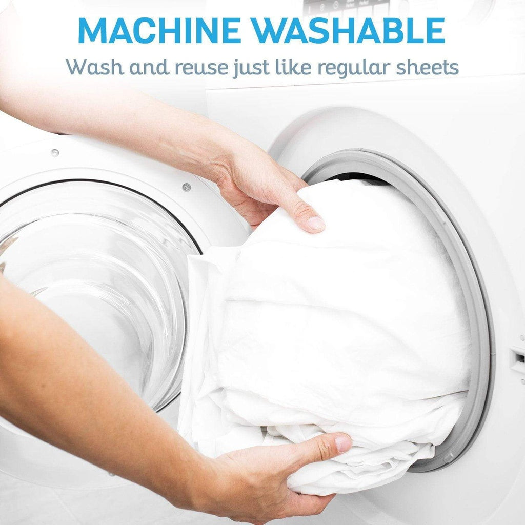 Person holding a white sheet with 'Machine Washable' text above it