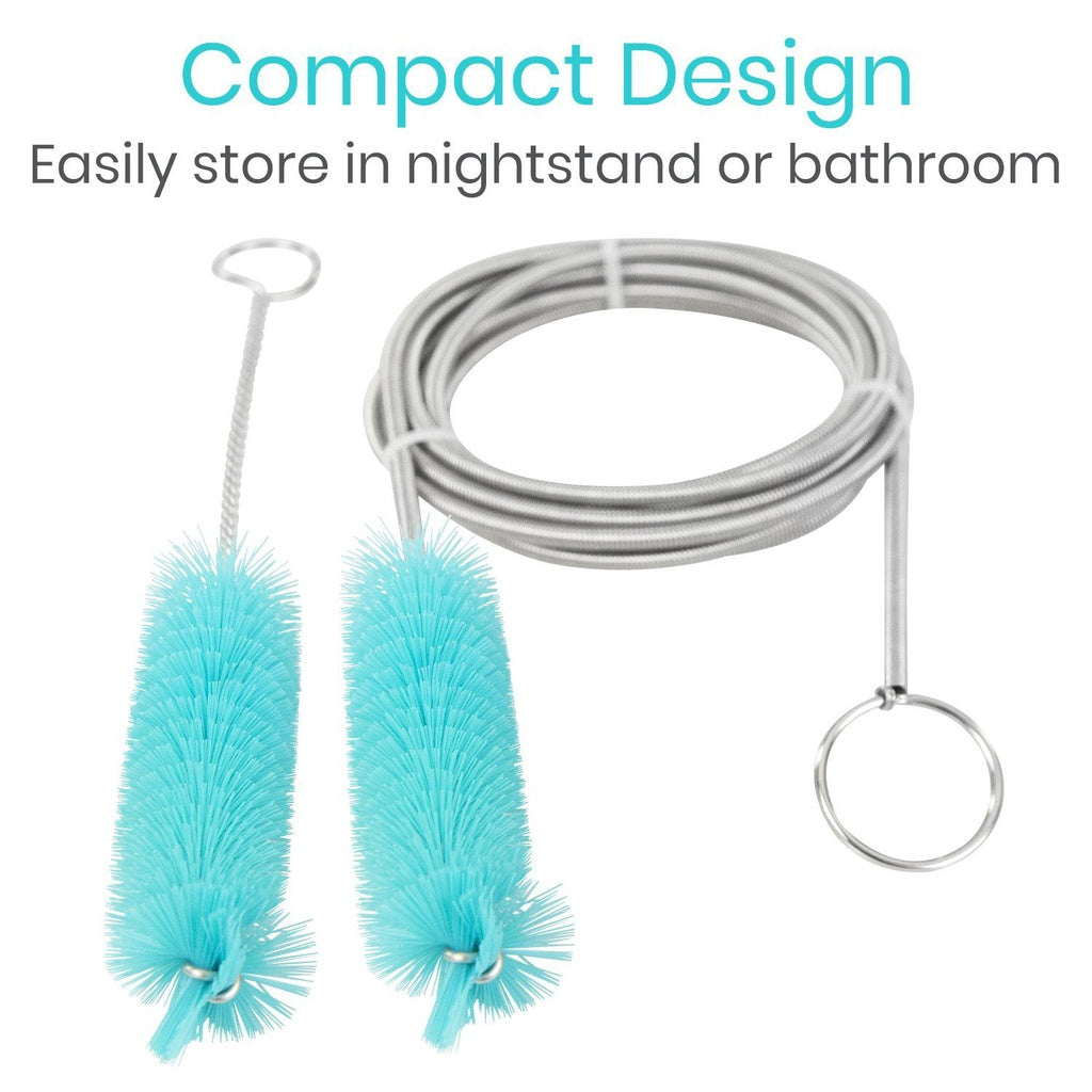 Teal cleaning brushes with a coiled cable on a white background