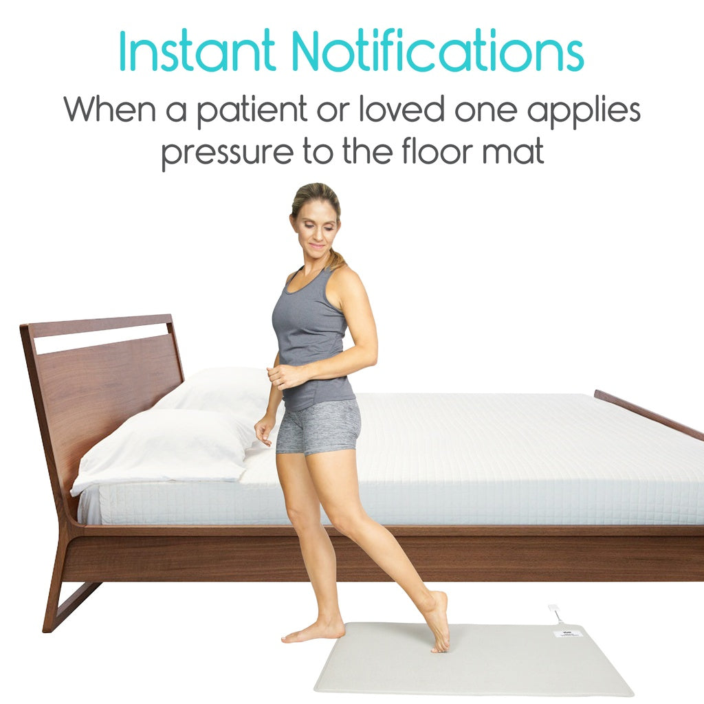 Woman standing on a floor mat with text about instant notifications when pressure is applied.