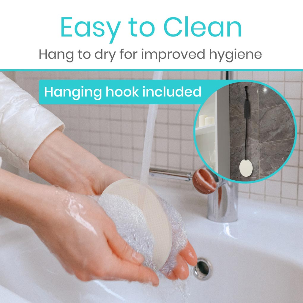 Person washing hands with a soapy sponge in a sink, with text about easy cleaning and hanging hook inclusion.