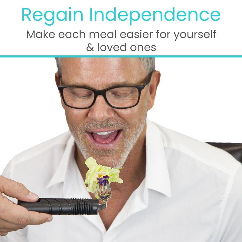 Man using a utensil with a lever mechanism, promoting independence in meal preparation.