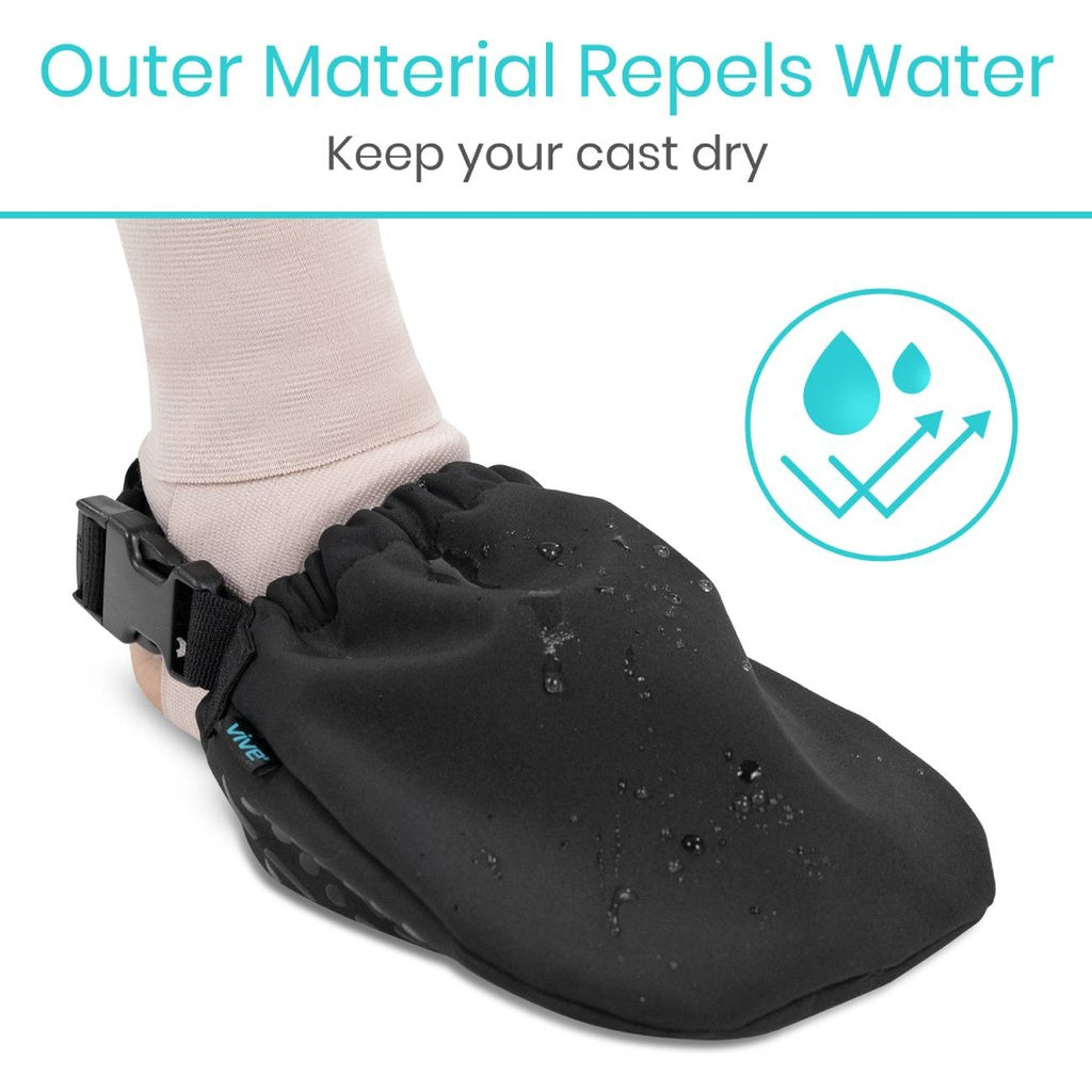 Black cast cover with a foot wearing a cast, showing water repellent material.
