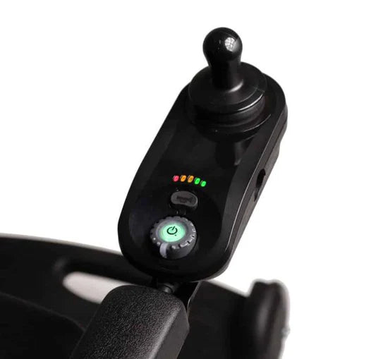 Close-up of a black control panel with buttons on a white background