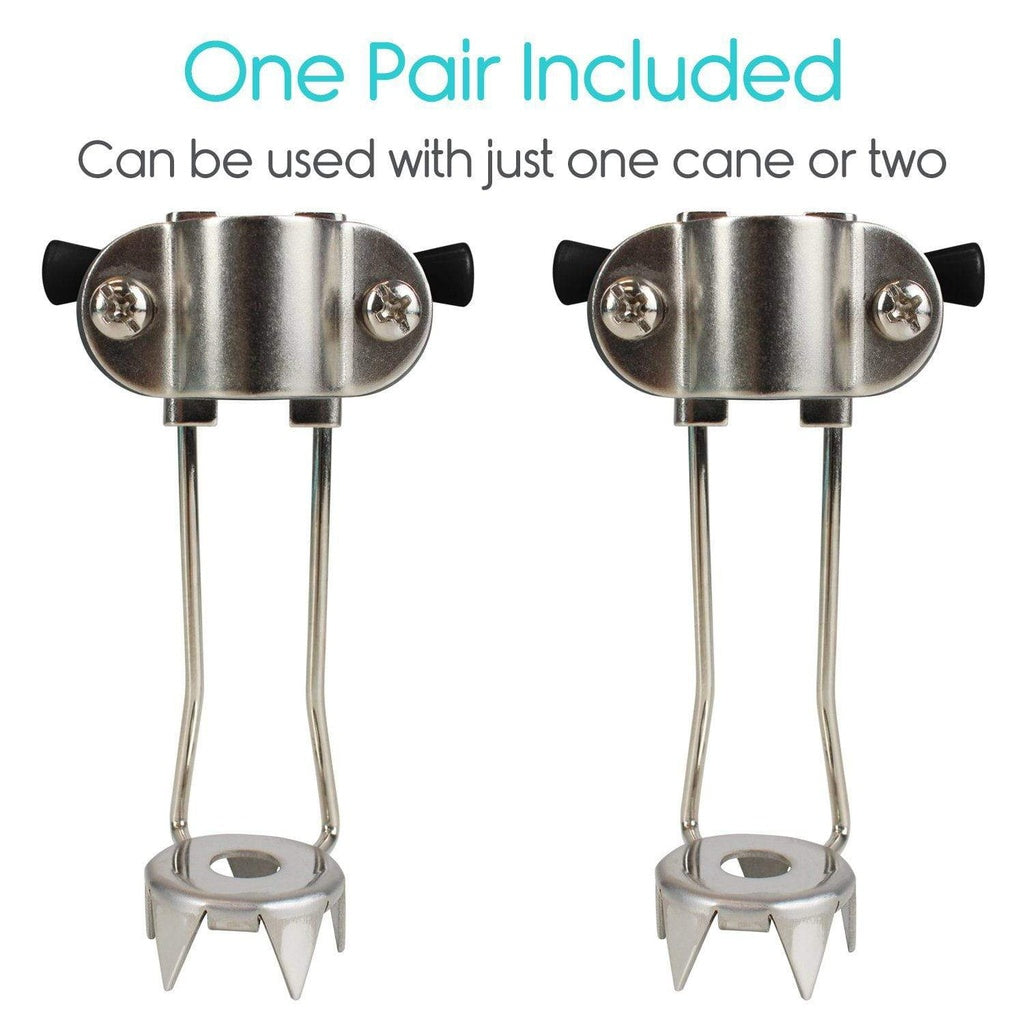 Two metal cane tips with spikes on a white background