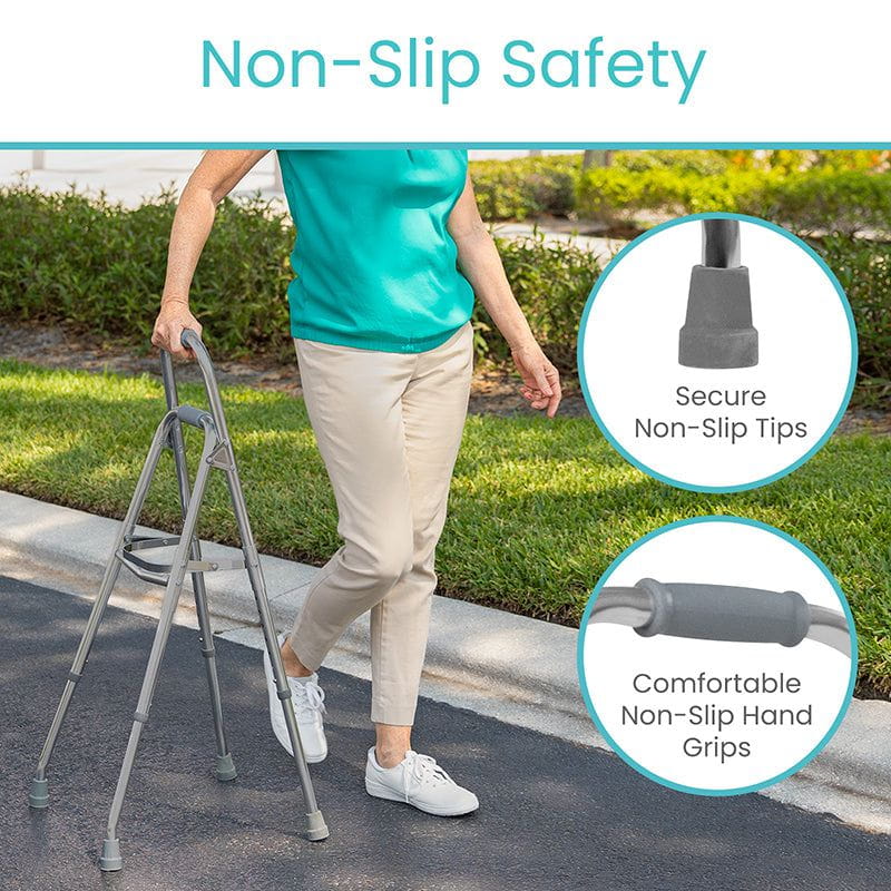 Person using a walking frame with non-slip features on a sidewalk.