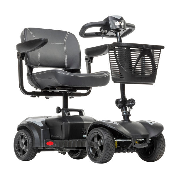 Black mobility scooter with basket on a white background
