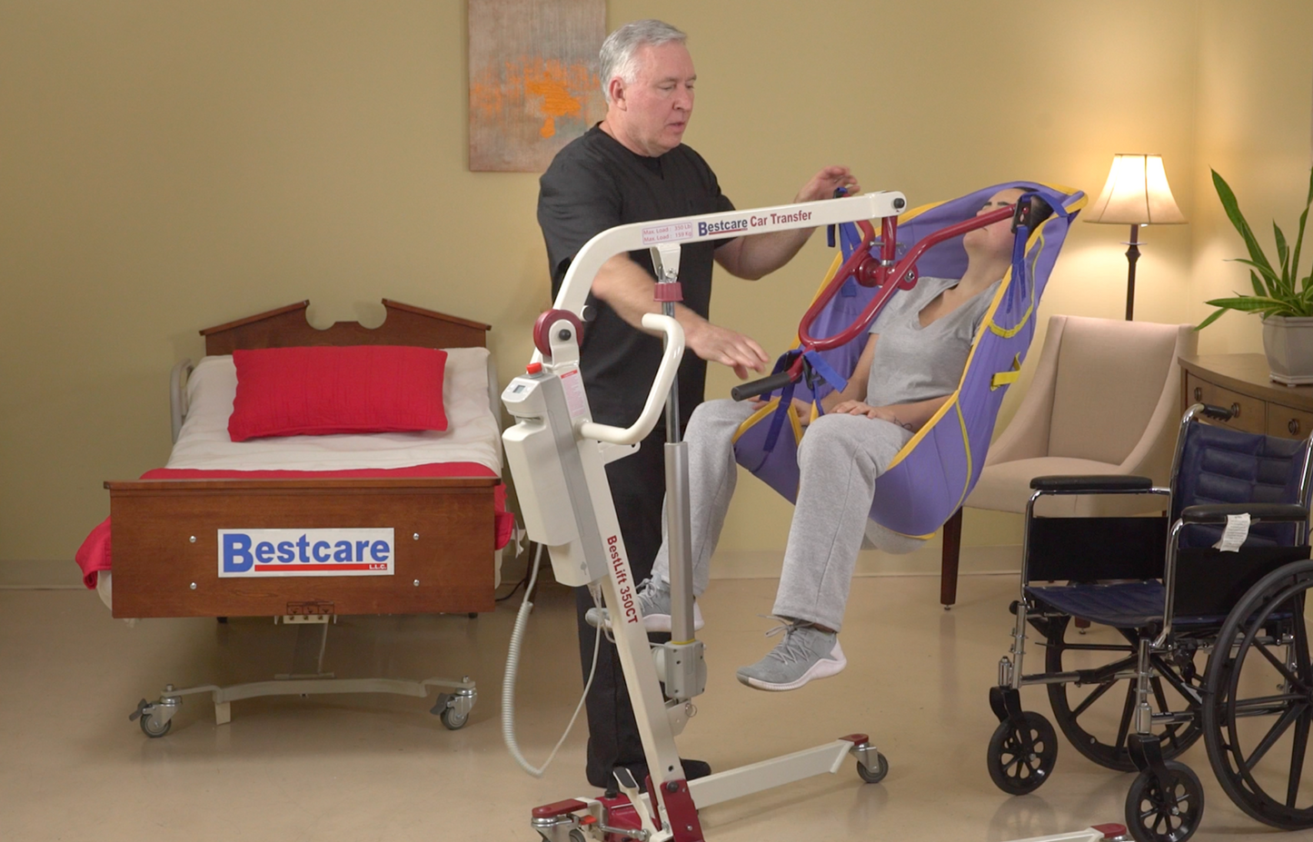 PL350CT Transfer Lift being used to put patient into wheelchair