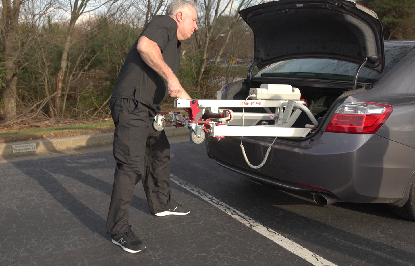 PL400EF being put into a car easily by a caregiver