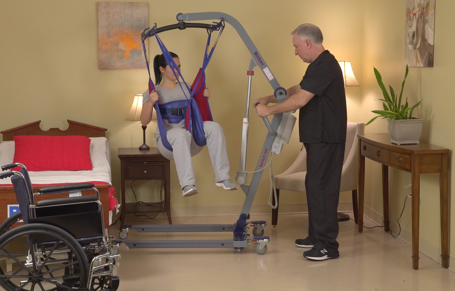 PL500 patient lift being used to lift patient up