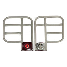 Metallic trailer hitch with a red light on a white background