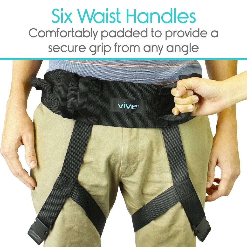 Person wearing a black waist handle harness with 'vive' branding, text about secure grip.