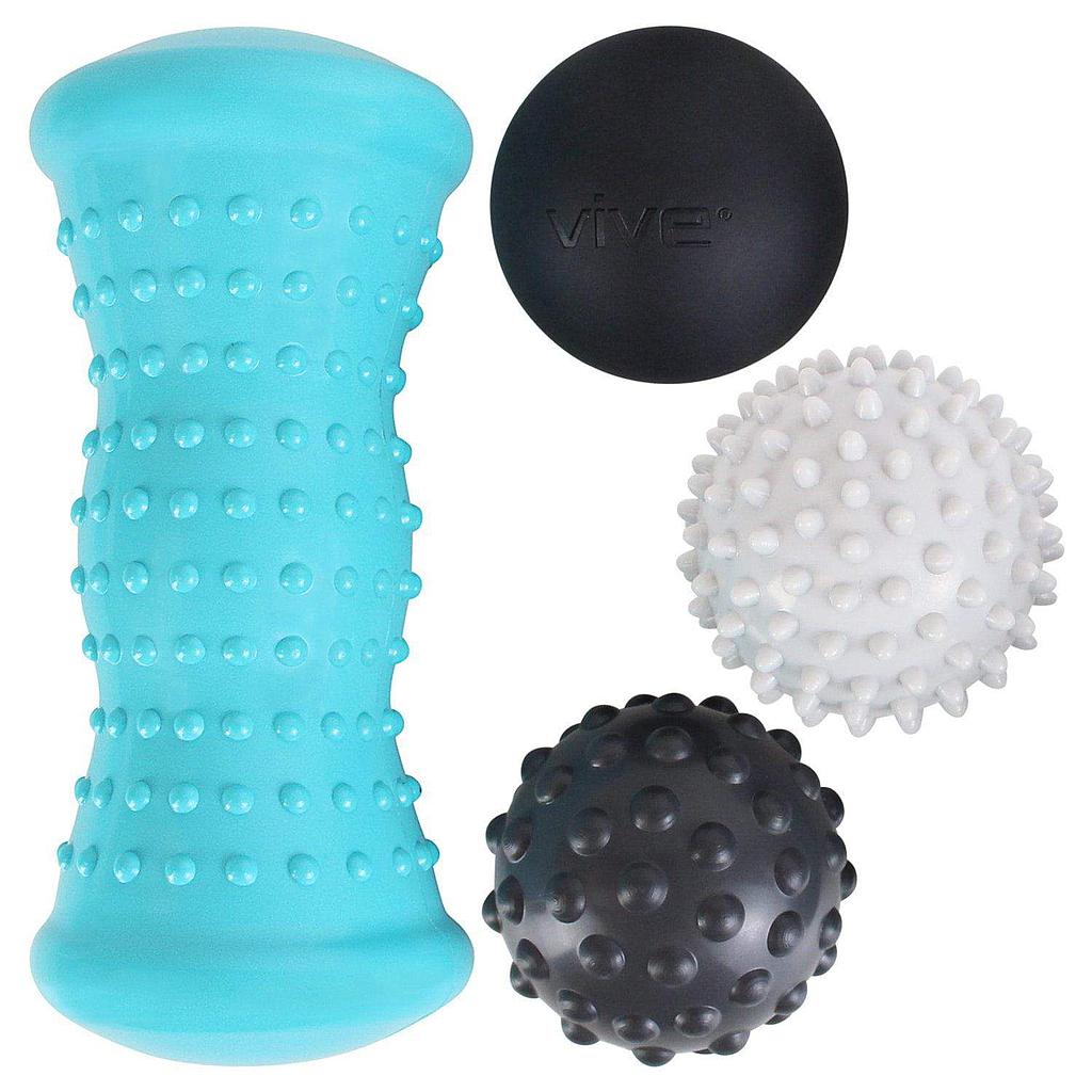 Set of massage balls and roller with textured surfaces on a white background