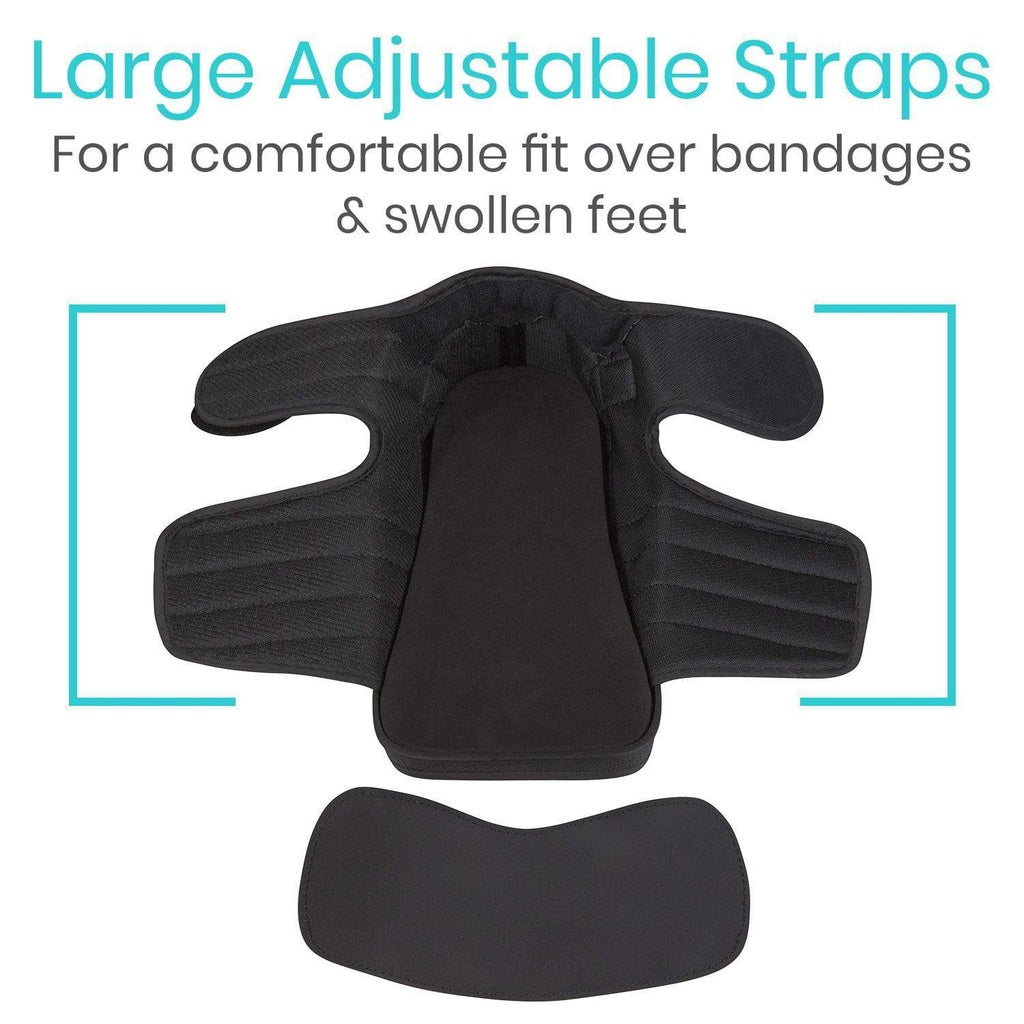 Black orthopedic pad with large adjustable straps on a white background