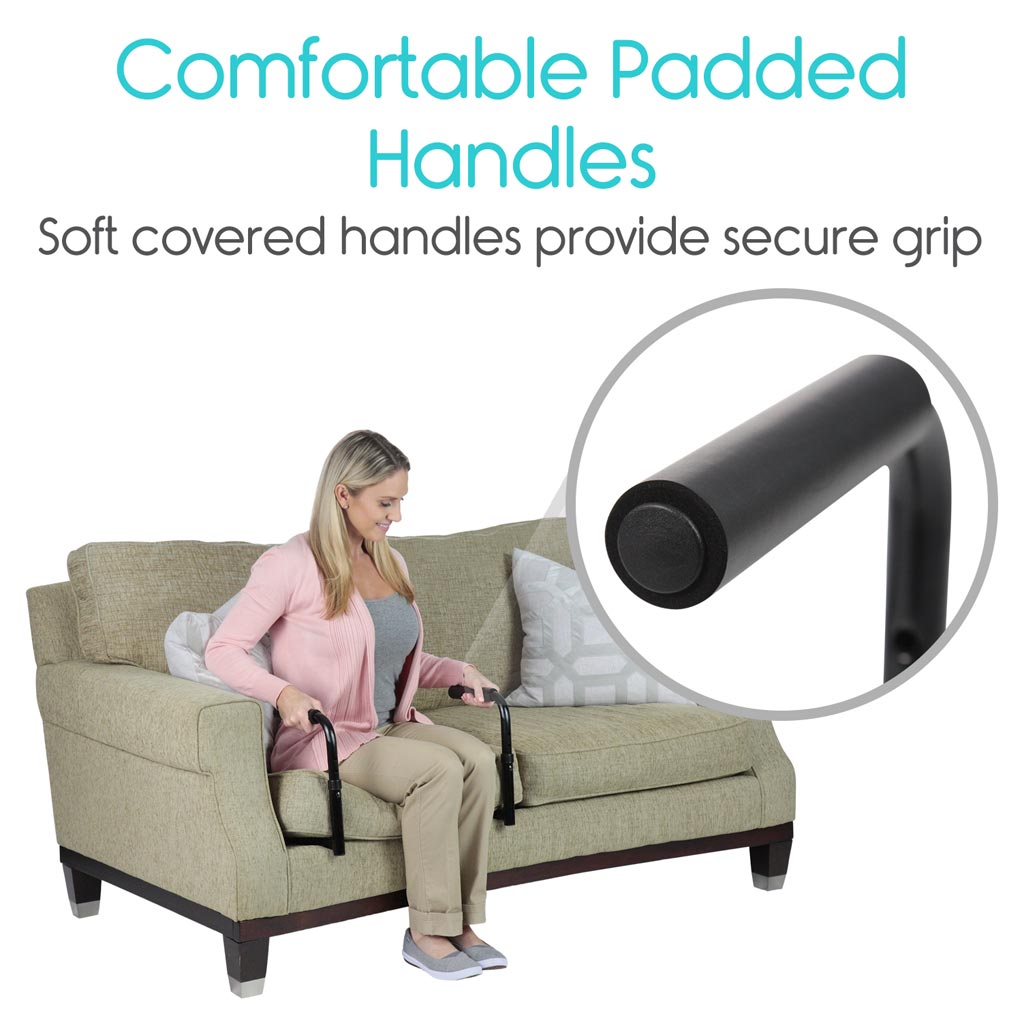 Woman using a sofa with soft covered handles on a beige sofa, text 'Comfortable Padded Handles' and 'Soft covered handles provide secure grip'.