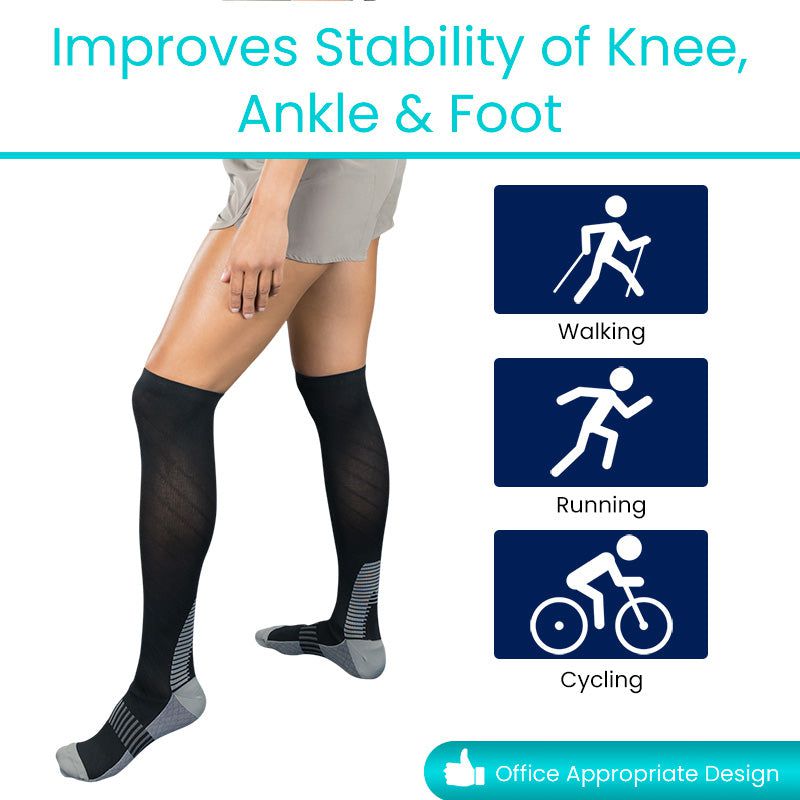 Person wearing black knee-high socks with icons indicating use for walking, running, and cycling on a white background.