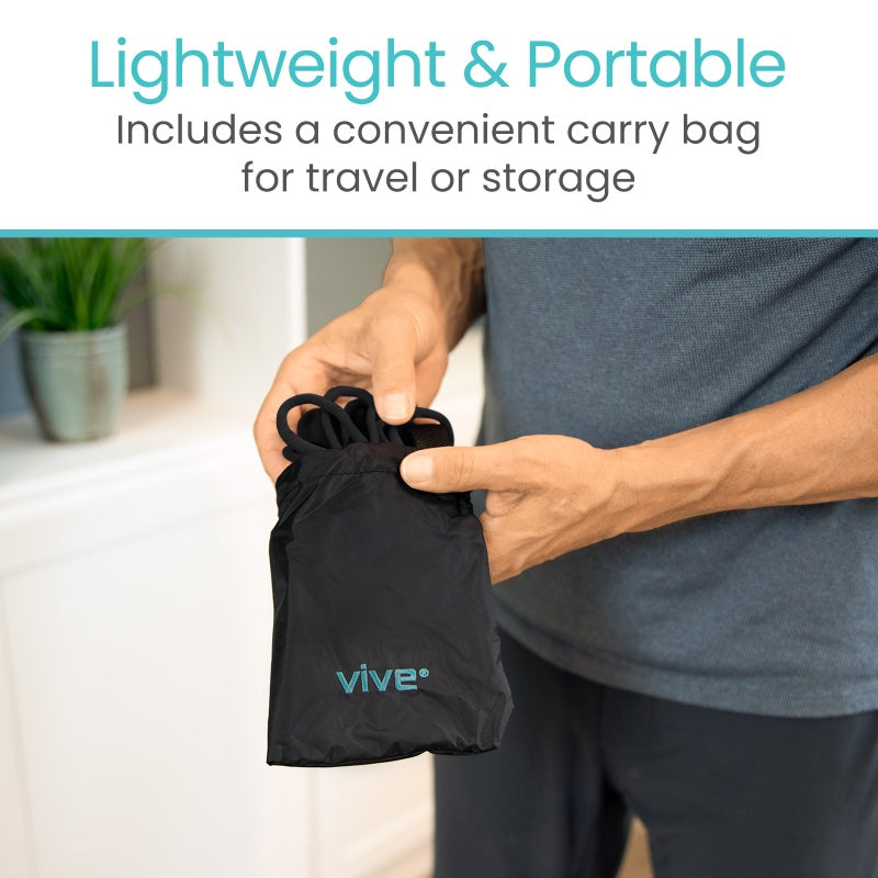 Person holding a black 'Vive' carry bag with text about its portability.
