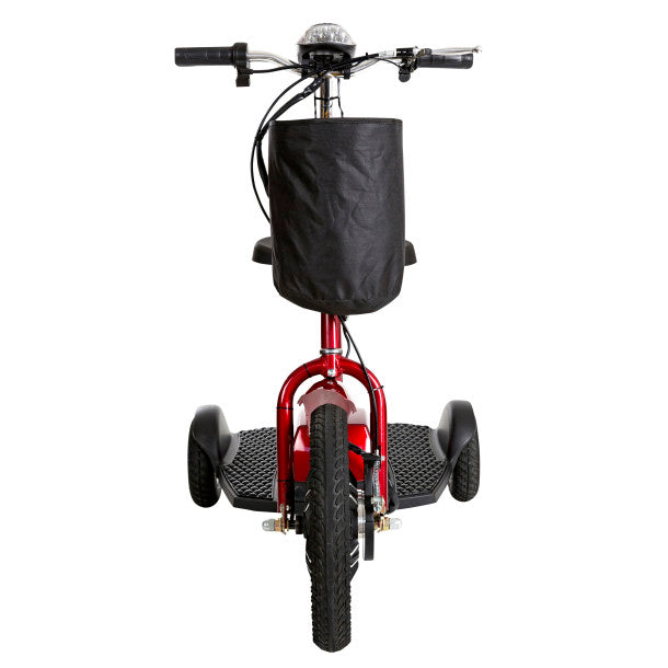 Red tricycle with a black bag on a white background