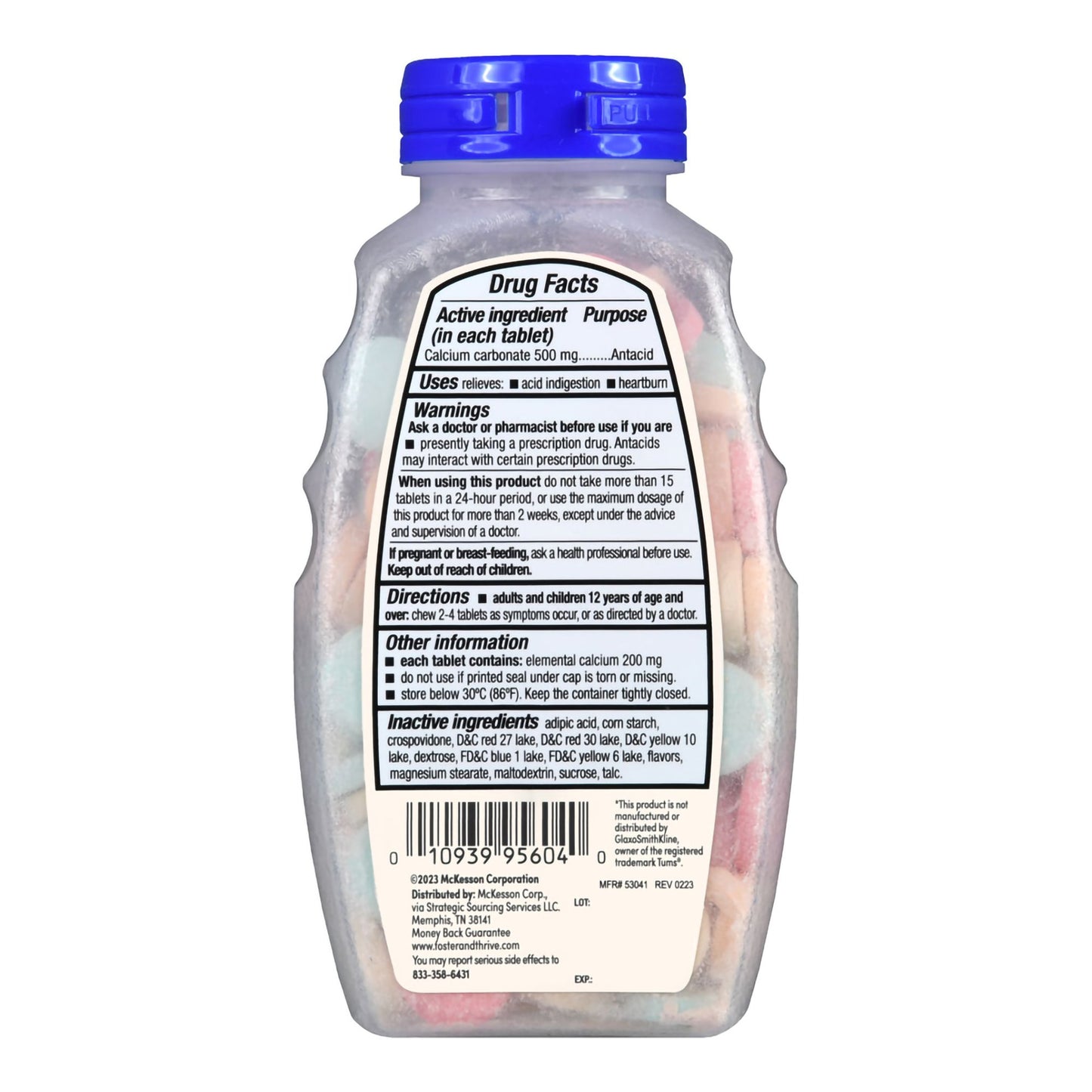 Bottle of vitamins with a blue cap and label on a white background