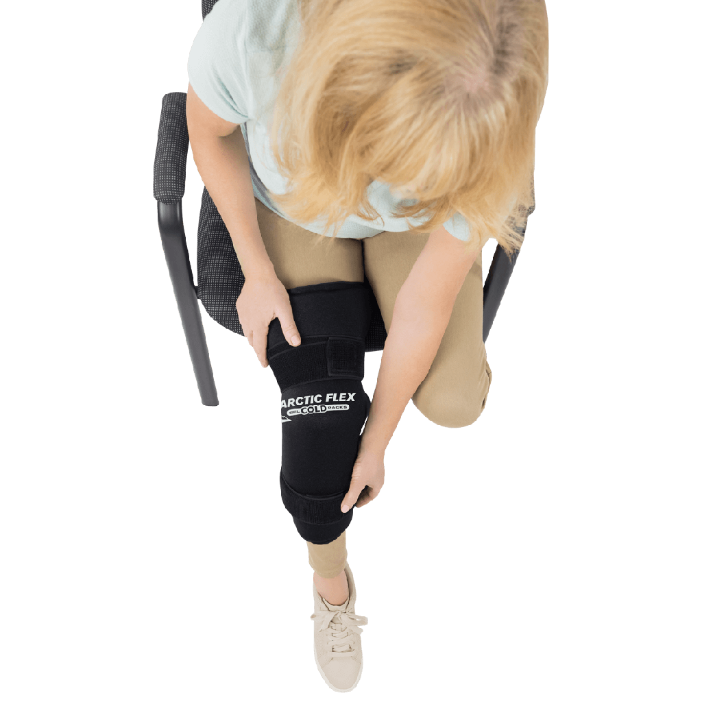 woman putting knee brace on