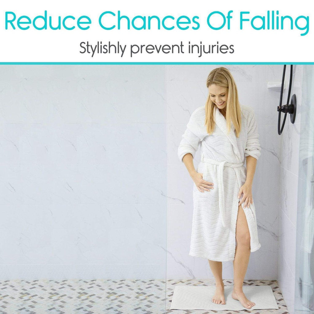 Woman in a white bathrobe standing on a mat with text about reducing falls and preventing injuries.