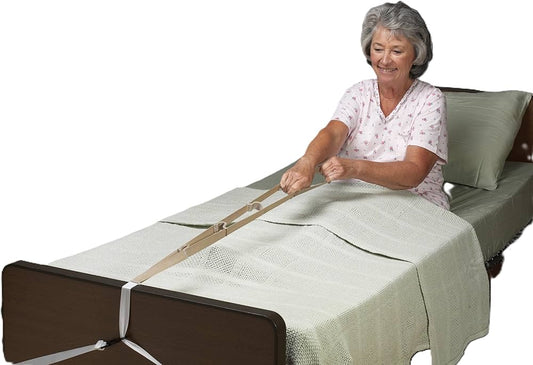 Woman using a bed rail on a hospital bed