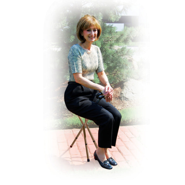woman sitting on cane seat
