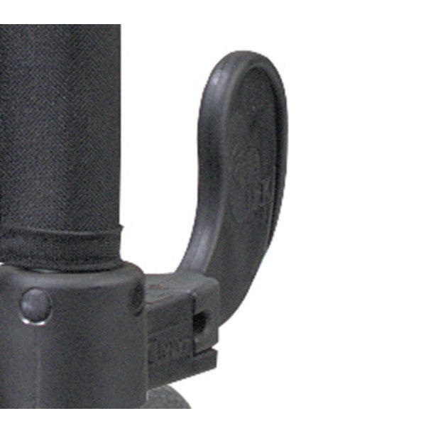 Close-up of a black microphone with a pop filter on a white background