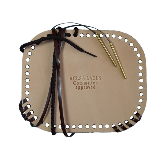 Beige leather case with holes, black and brown strings, and gold pen on a white background
