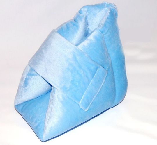 Blue wedge pillow on a white background