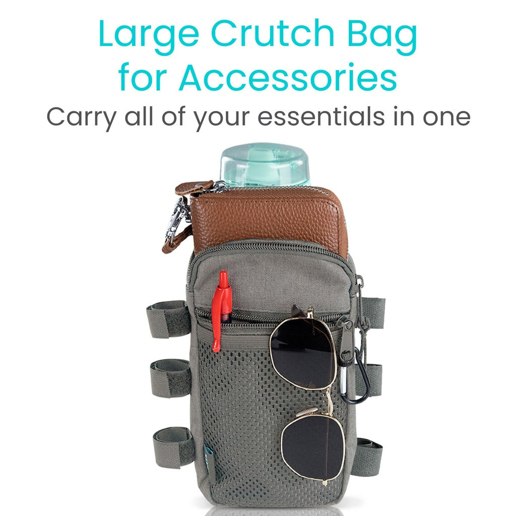 Gray crutch bag with sunglasses, water bottle, and other accessories on a white background