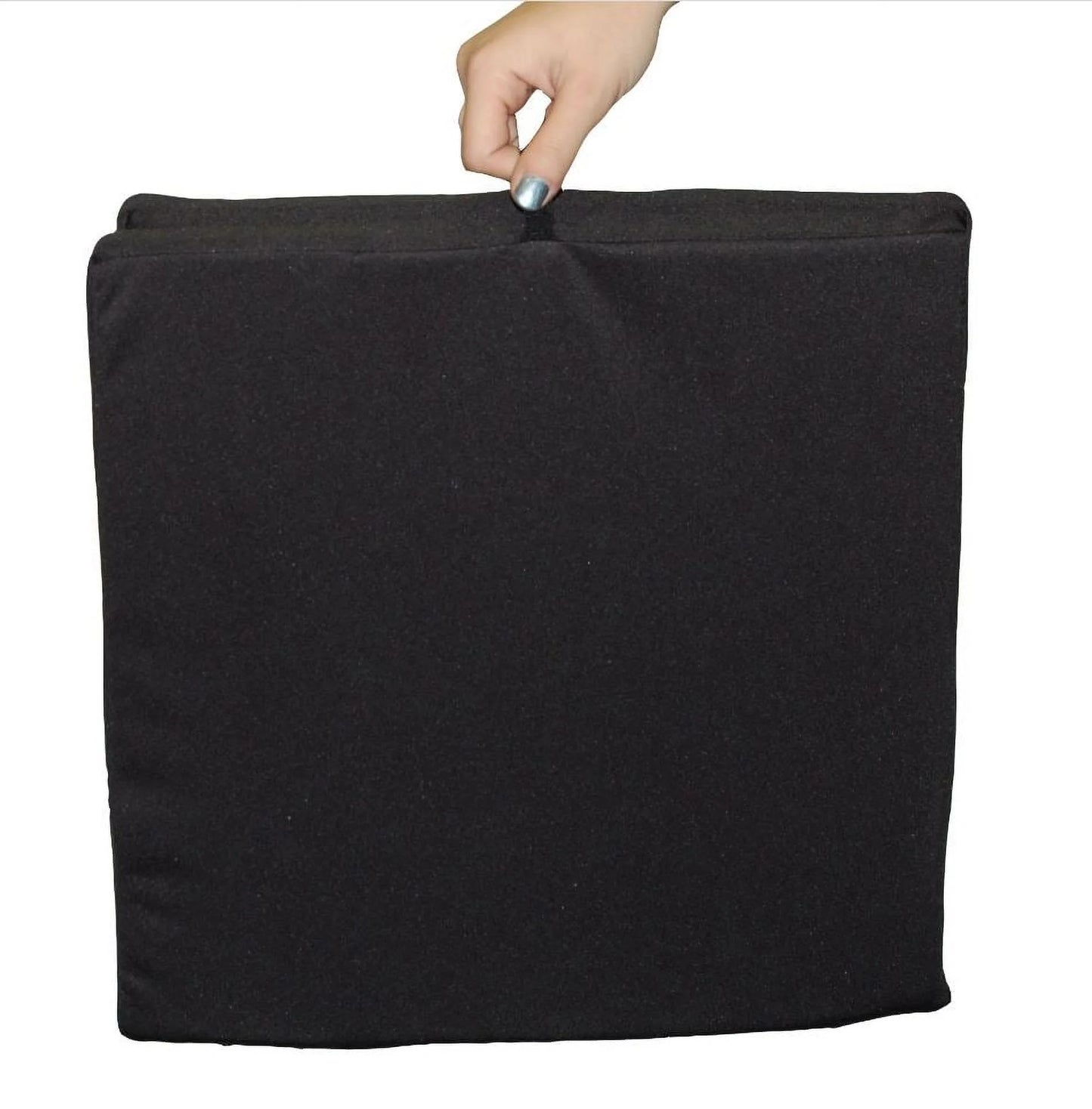 Black fabric with a hand holding it on a white background
