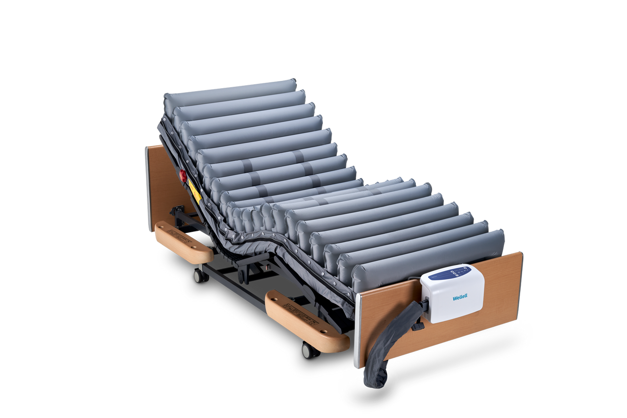Electric adjustable hospital bed with air囊technology on a white background