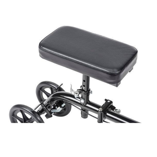 Black motorcycle seat with adjustable mechanism on a white background