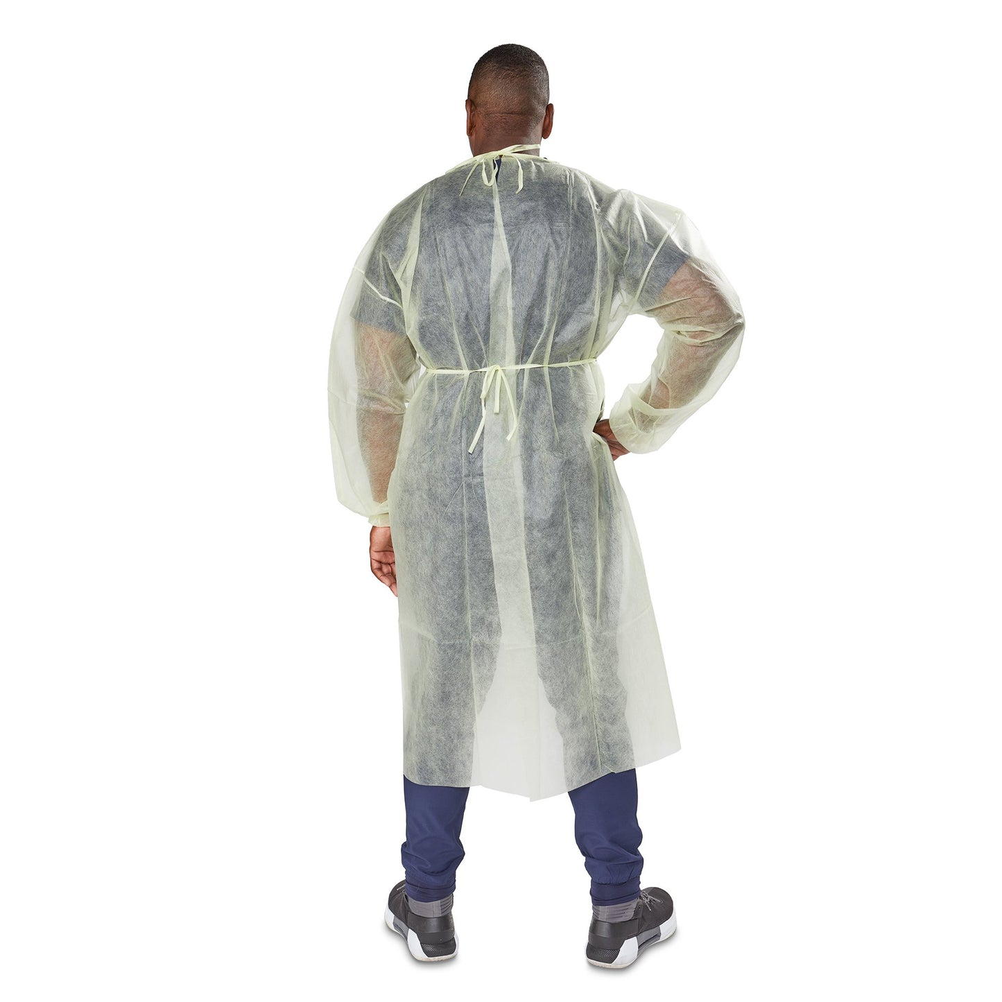 Person wearing a clear plastic protective gown on a white background