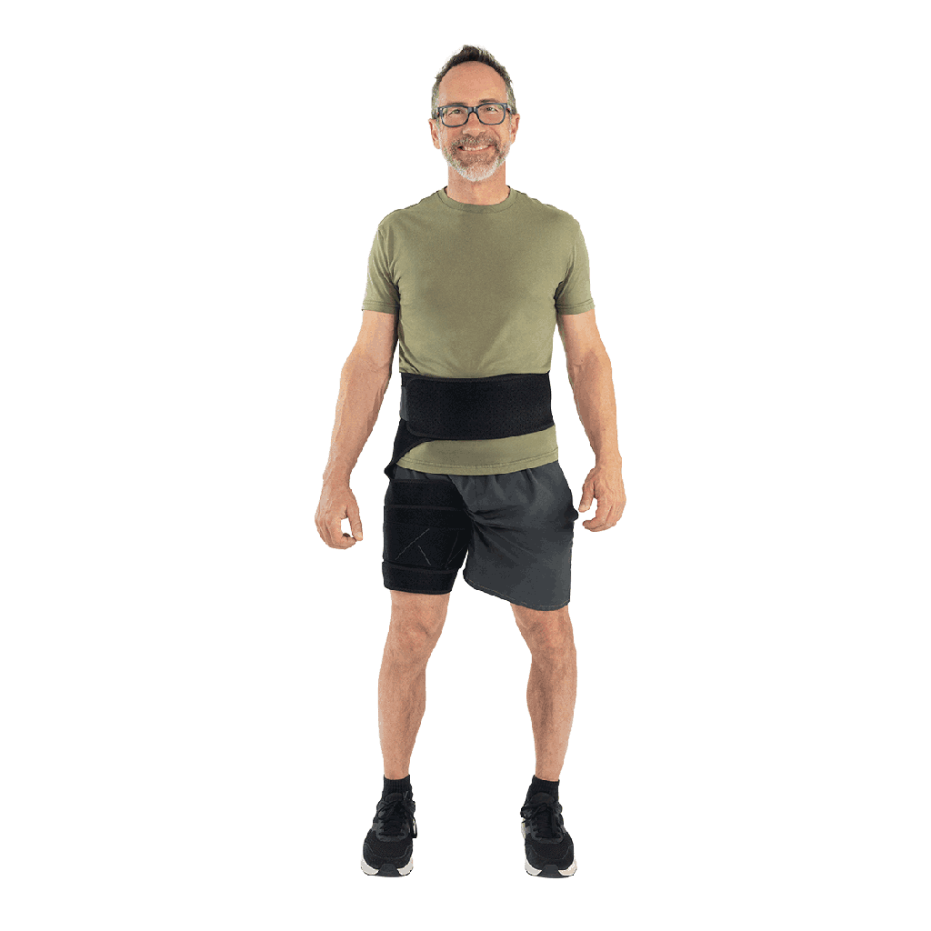 Man wearing a green t-shirt and black shorts on a white background